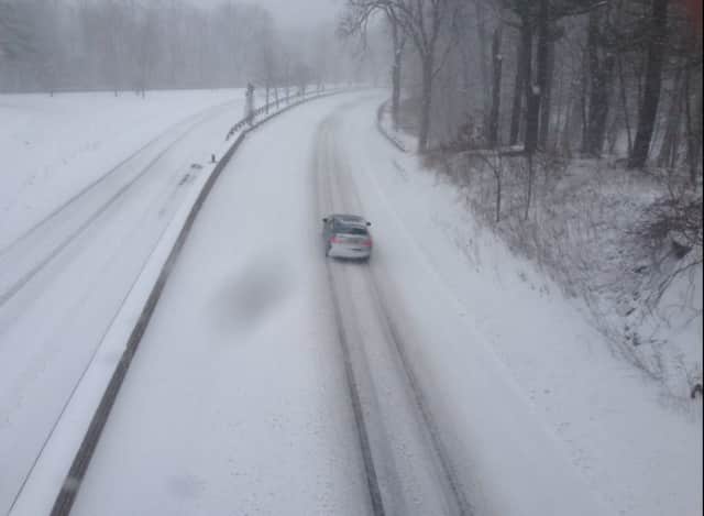 A snow-covered Merritt Parkway in a previous storm.