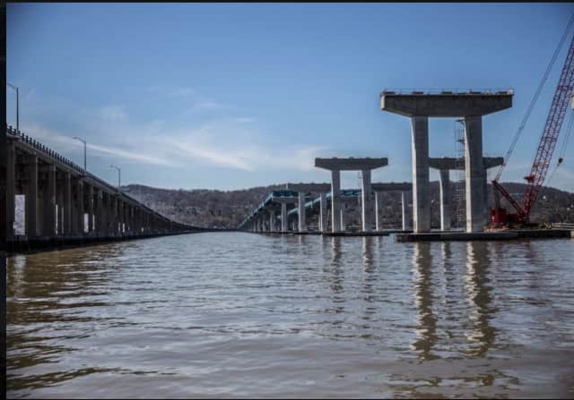 The Tappan Zee Bridge, left, as construction continues in the new bridge.