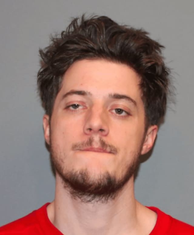 Brandon Dupee's mugshot after his Tuesday night arrest by Norwalk Police on impaired driving charges. He died six hours later in an accident in Fairfield that also claimed his sister's life.
