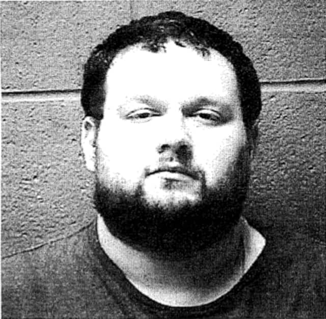Brian Wolfe was arrested by the Beacon police for the sexual abuse of a girl under the age of 11.