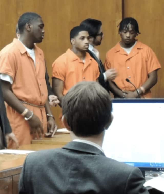 Nyje Johnson, center, and two other defendants in Hackensack Superior Court.