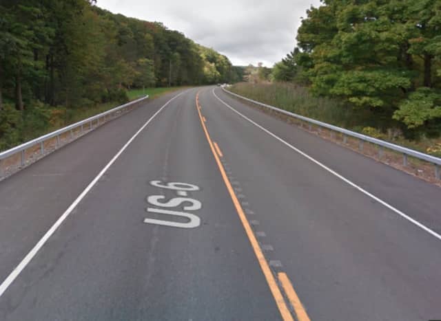 A Rockland County corrections officer was shot in the head while driving his car along Route 6.