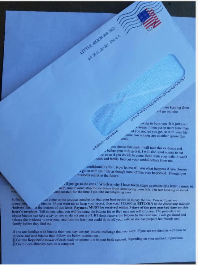 A look at the blackmail scam letter and the envelope it arrived in, provided to Daily Voice by a New Canaan resident who received it.