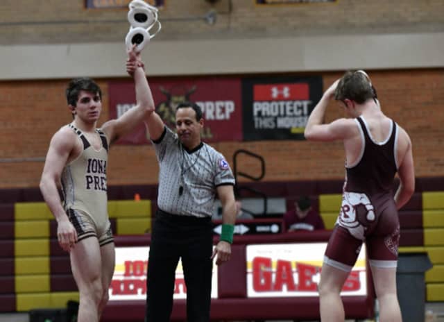 A.J. Kovacs, a resident of Danbury and junior at Iona Prep won the Division-I 145-pound New York State wrestling title at the championship meet in Albany, becoming the first to ever win state titles in both New York and Connecticut after he claimed a