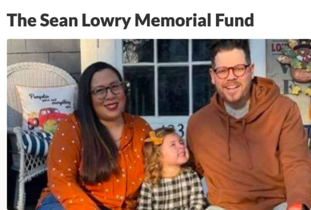 Sean M. Lowry with daughter, Grace, and wife, Devonne.