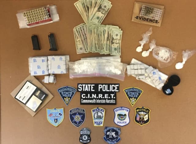 Massachusetts State Police Commonwealth Interstate Narcotics Reduction Enforcement officers busted a heroin distribution ring.