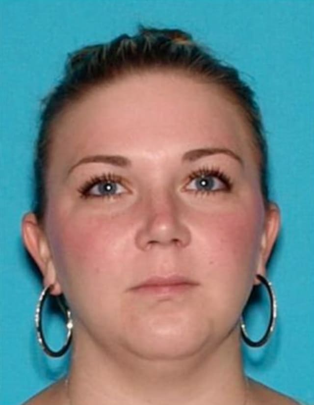 Elizabeth A. Holmes, 37, is wanted out of Mansfield on charges of child neglect, two counts of drug possession and possession of drug paraphernalia, township police said.