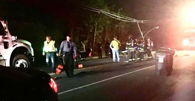 A driver was extricated and taken to a nearby hospital after a rollover crash caused entrapment and brought down several power lines in Warren County, authorities said.