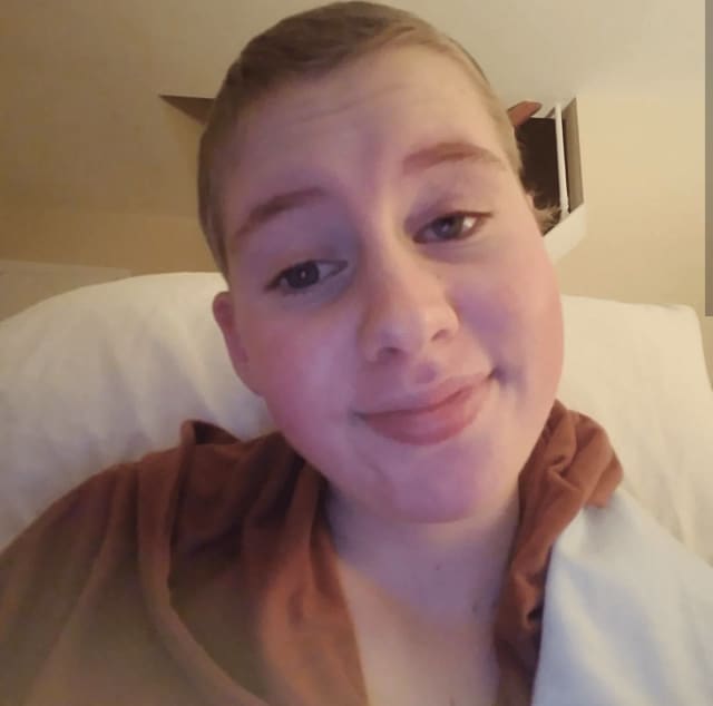 Natalie Lopack in a selfie she took Friday afternoon in her hospital bed.