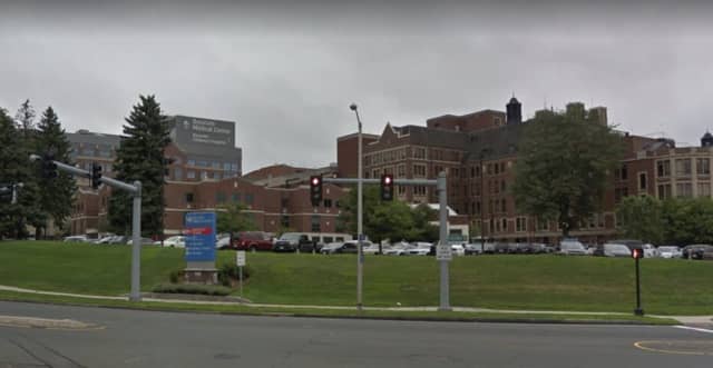 An outbreak of COVID-19 at Baystate Health has left 23 employees and 13 patients infected. Pictured here is the Baystate's Springfield hospital.