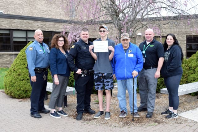 Brewster High School sophomore Timothy Kolka was presented with a certificate for his heroic actions, the school district announced.