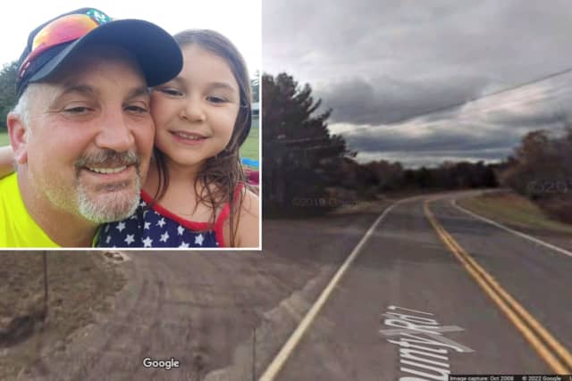 Michael Manetta, age 54, pictured with his 6-year-old granddaughter, Amelia. Police said Manetta died Sunday, July 31, in a motorcycle crash on County Route 7A in Copake.