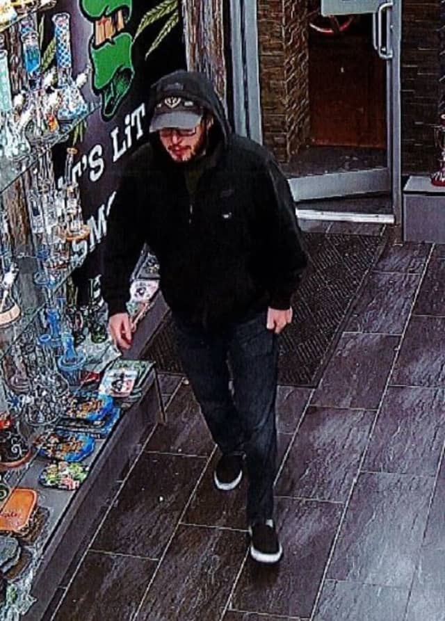 Police are asking for the public’s help finding a man accused of using stolen credit cards at two stores in Huntington.