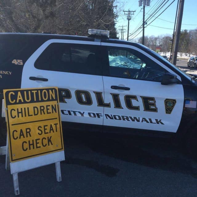 Contact the Norwalk Police Department to make sure you're buckling your kids in safely.