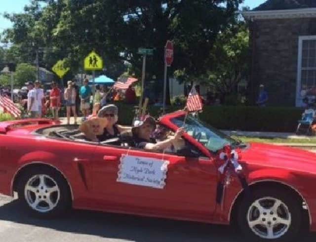 Hyde Park celebrates July 4th with a parade. Members of the local historical society are shown, Roberta Brodie, Joanne Lown, Patsy N. Costello, and Susan Schryver (driver).