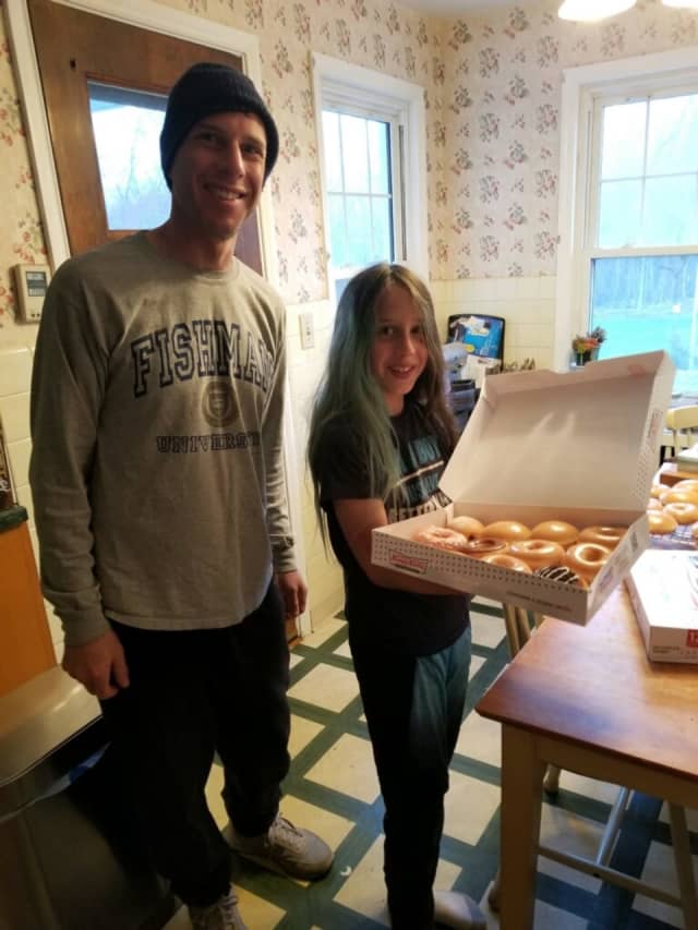 Shae Fishman came home from camping in front of the new Paramus Krispy Kreme store with a dozen doughnuts -- and he'll get more each month for a year.