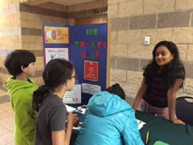Students sign up for activities at a recent club fair at Irvington Middle School.