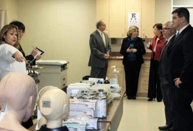 Dr. Joann La Perla-Morales and Dr. Anne Prisco (center) tour the Nursing Resource Center at Felician University along with administrative members from Middlesex Community College.