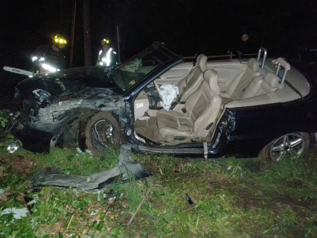 Firefighters had to use hydraulic tools to remove the driver from this car-into-a-tree crash in Westport early Saturday. 