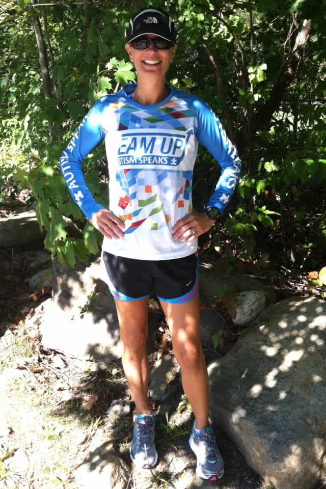 Paula Muller of New Canaan, who is running Sunday's New York City Marathon, raised $12,000 for Autism Speaks before last year's race, which was canceled by Superstorm Sandy.