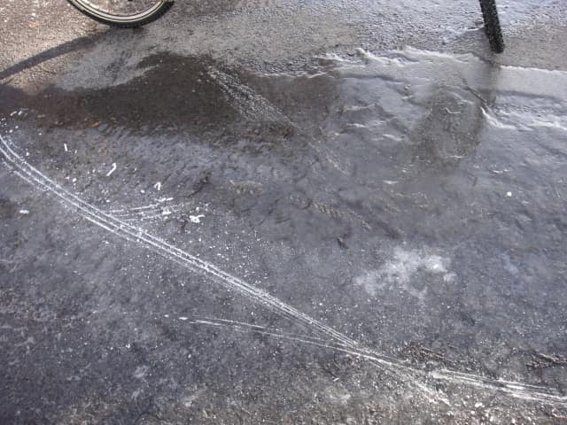 The National Weather Service had warned of black ice on Friday evening after melting snow began to refreeze.