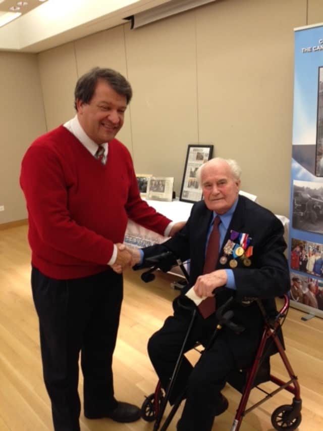 Veteran John Kulhan recently spoke at the Mamaroneck Public Library about his new book. 
