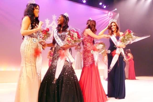 The winners of the 2013 Miss Teen Westchester and Hudson Valley and Miss Westchester and Hudson Valley Pageants congratulate each other on stage at the White Plains Performing Arts Center.