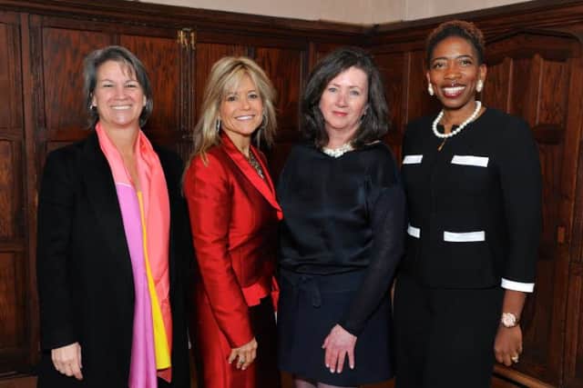 From left, Suni Harford, Judith Huntington, president of the College of New Rochelle, Peyton R. Patterson, and Carla Harris 