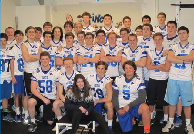 Darien football players and Grace Wohlberg will be at "Lifting Grace," a weightlifting fundraiser, on March 13 and 14 at Darien High School.