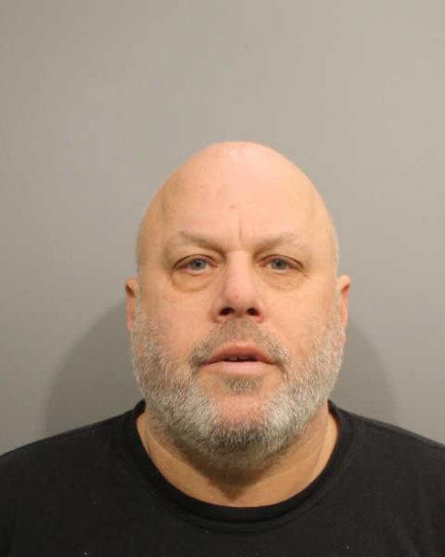 Wilton resident Michael Waldman was charged with disorderly conduct and second-degree threatening for making threatening comments toward two staff members at Cider Mill School Monday morning, police said