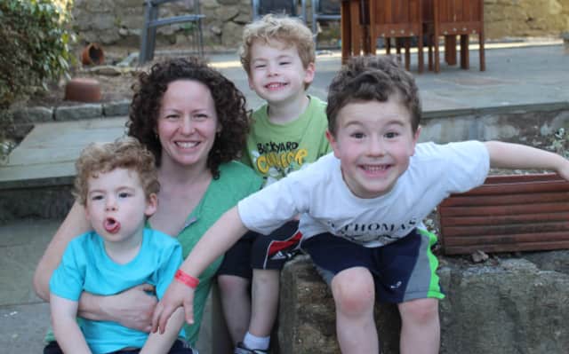 Elaine Studdert and her children, Dylan, Liam and Matthew. 