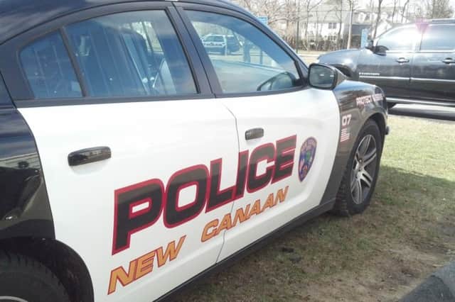 An Ossining, N.Y., man is under arrest after allegedly driving under the influence and crashing into a tree in New Canaan.