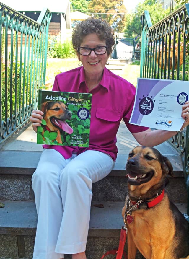 Linda Griffin poses with Ginger, the subject of her award winning book.