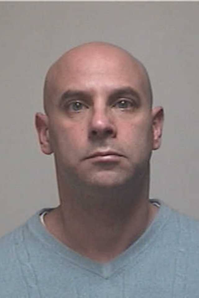 Former Westport swim coach was sentenced to eight years in prison for sexually assaulting two Fairfield girls. 