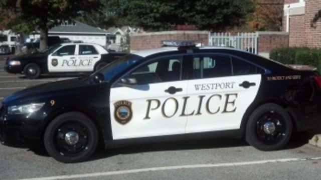 A Westport woman was charged with biting two police officers and an EMT. 