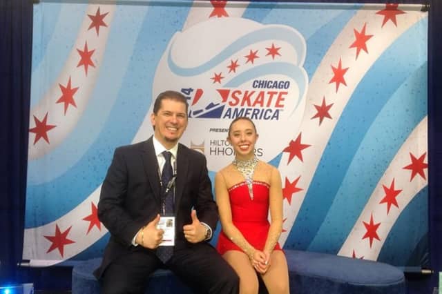 Redding skater Brooklee Han and her coach Serhii Vaypan celebrate her new personal best score in the Kiss and Cry at Skate America earlier this fall. 