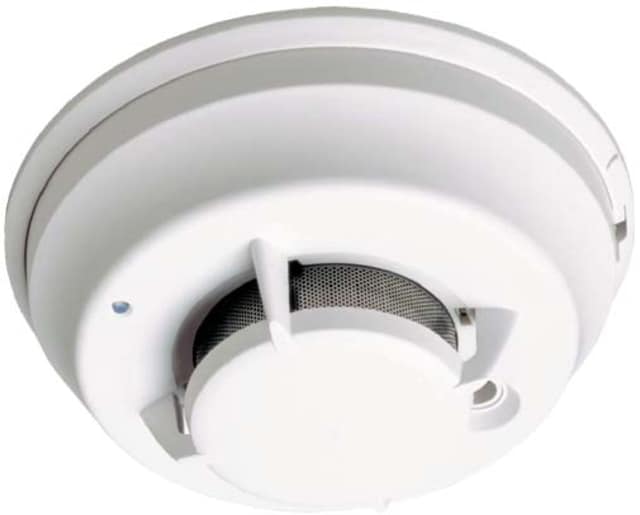 New Rochelle firefighters distributed free smoke detectors.