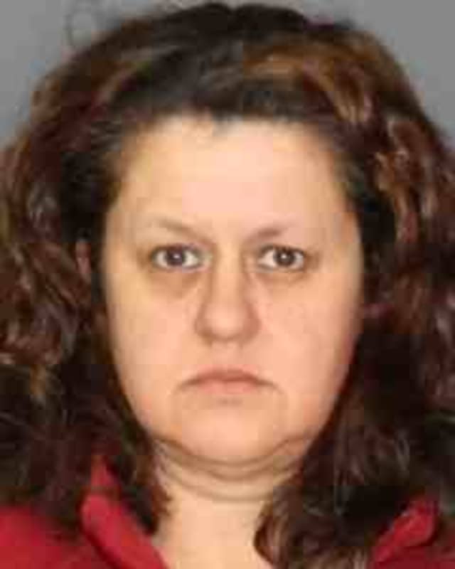 A Mount Kisco woman pleaded guilty to stealing nearly $1.4 million from two bank customers. 