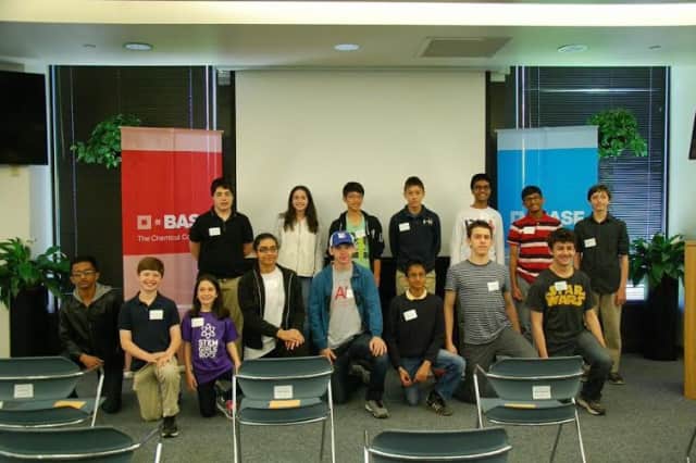 Pictured (kneeling) are students Henry Demarest (second from left), Aayushi Jha (fourth from left), and Rishi Madabhushi (third from right). Standing are Zachary Rosman (first on left) and Rishit Gupta (second from right).