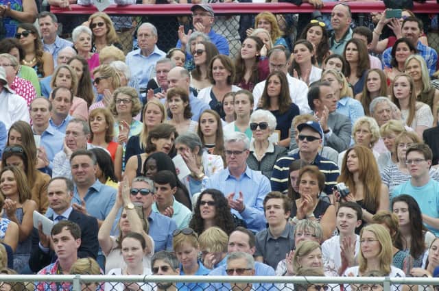 A large crowd fills the stands for the 2015 graduation at New Canaan High School.