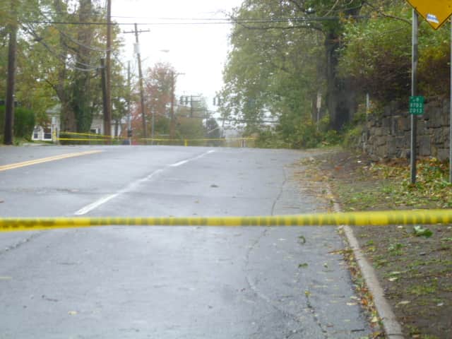 Several streets in Hastings are closed due to downed wires and tree removal, like this section of Broadway, but many local businesses are opened.