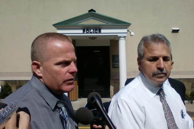 Ardsley detective Ronald Perkins, left, and Chief of Police Emil Califano discuss the home invasion.