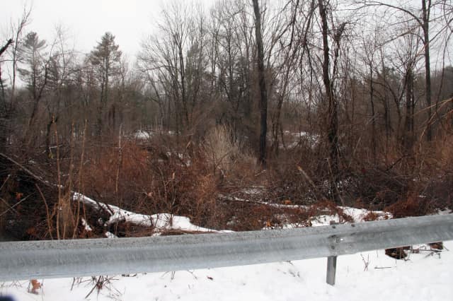The incident occurred in the woods near the Brewster Ice Arena.