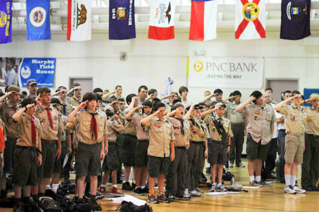 The Boy Scouts of America's executive board has put off its decision on whether to lift a ban on gay members. Some Scouts are seen here at a Texas meeting.