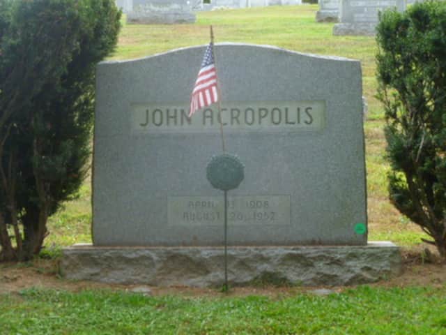 The grave of union leader John Acropolis is set on a hill just inside the Jackson Avenue entrance to Mount Hope Cemetery in Hastings.