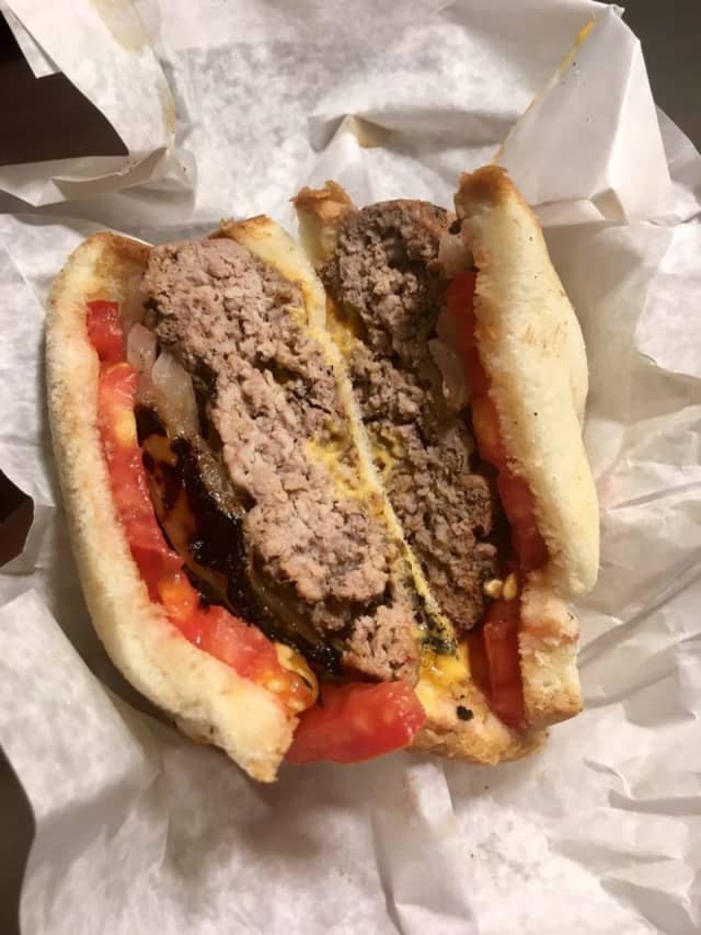 The Original Burger from Louis' Lunch in New Haven earned a spot on The Daily Meal's list of the 101 Best Burgers in America.