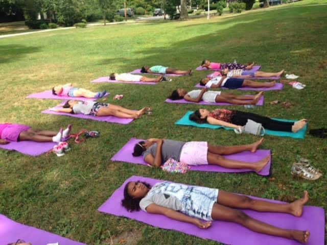 An outdoor yoga class.
