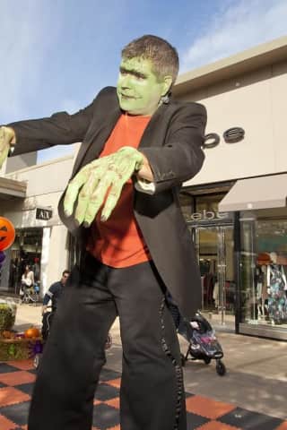 Trick Or Treat? At Cross County Shopping Center, Folks Get Both